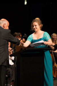 Heather Lewis-Baker receiving the People's Choice Award from Howard Harvey